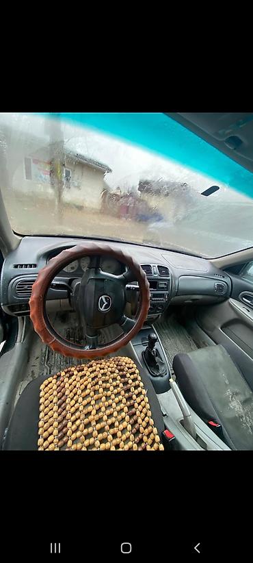 mazda 2000: Mazda 323: 2003 г., 1.6 л, Механика, Бензин, Хэтчбэк — 3