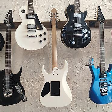 Гитары: Elektro-gitara Smiger S-G5 Simlərin sayı: 6 Üst: Cökə ağacı Qol — 2