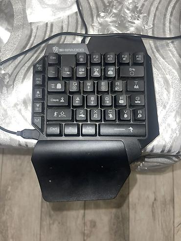en ucuz noutbuklar: Shipadoo markalı bir əlli oyun klaviaturasıdır. Kompakt quruluşa — 1