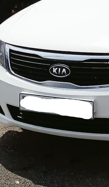 optima otracaqlar: Kia Optima sedan – ağ rəng, 4 qapı, ön‑çəkiş. 2008 ci il motor təzə — 2