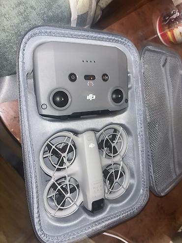 Фото и видеокамеры: DJI NEO Fly More Combo — ультрапортативный дрон с полной защитой — 4