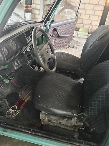 vaz oka satilir: VAZ 2104 universal kuzovlu minik avtomobil. Maşın açıq yaşıl rəngdədir — 8
