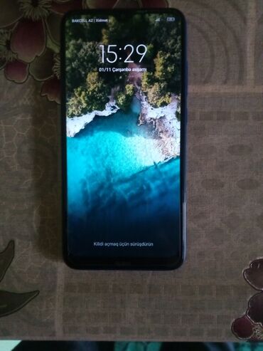 zhenskie bryuki iz gabardina: Xiaomi Redmi 8, 64 ГБ, цвет - Синий, 
 Отпечаток пальца