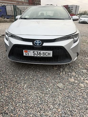 Toyota Corolla: 2020 г., 1.8 л, Вариатор, Гибрид, Седан