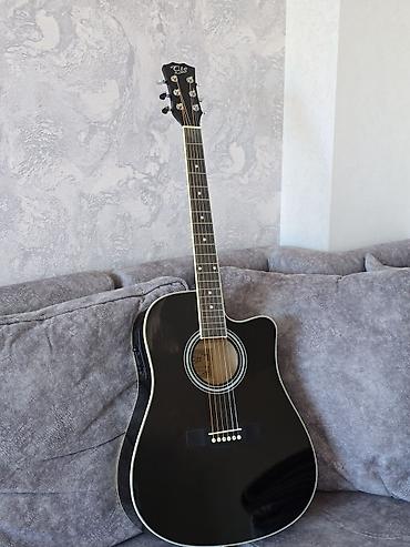 Akustik gitaralar: QTE elektro -akustik gitara Gitara bir neçə aydır ki, məndədir. QTE — 1