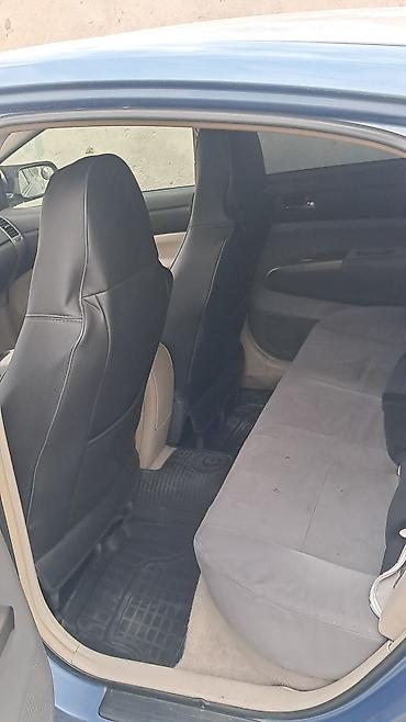 Toyota: Toyota Prius (II nəsil) hibrid hetçbek - Rəng: mavi - Kuzov: 5 qapılı — 4