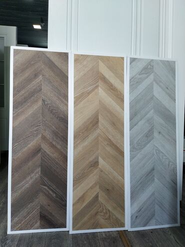 Linoleum: Herringbone naxışlı, müxtəlif rənglərdə taxta görünüşlü döşəmə