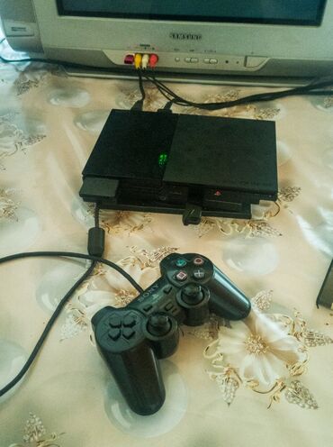 nabran yolu oyunu yukle: Sony PlayStation 2 oyun konsolu, orijinal qoşulma kabelləri və pultu