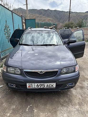 385 55: Mazda Capella: 1999 г., 2 л, Механика, Бензин, Универсал — 4