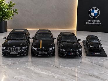 Коллекционные масштабные модели BMW в черном глянцевом исполнении