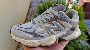 quechua cizme: New Balance 9060 patike – siva/bez nijansa
Dostupne u broju 38 — 5
