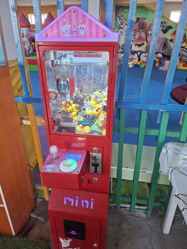 Игровые автоматы “Кран-машина” (аппараты с захватом призов) Описание