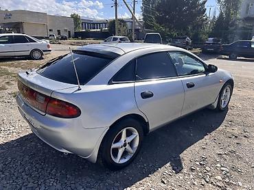 мазда демио дверь: Mazda Lantis: 1998 г., 1.5 л, Механика, Бензин, Хэтчбэк — 5