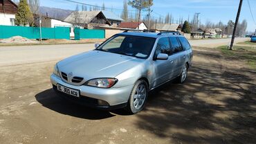 машина женил: Nissan Primera: 1999 г., 2 л, Механика, Бензин, Универсал