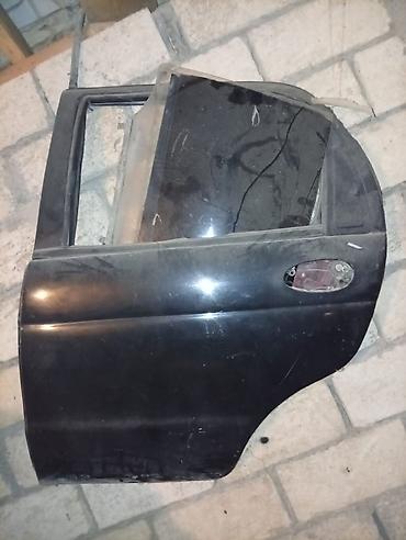 avto aksesuar kredit: Daewoo Matiz üçün avtomobil qapıları. Rəng: qara. Şüşələri — 2