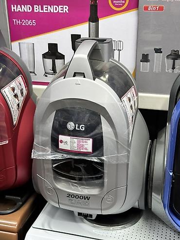 Пылесос LG, мощность 2000 Вт. Особенности: - Сильное всасывание для