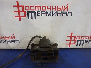 second tech: Передний левый суппорт Nissan 2002 г., Б/у, Оригинал, Япония — 2