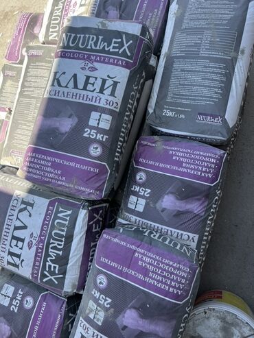 Штукатурка: Клей для керамической плитки NuuriNEX усиленный 302, в мешках по 25