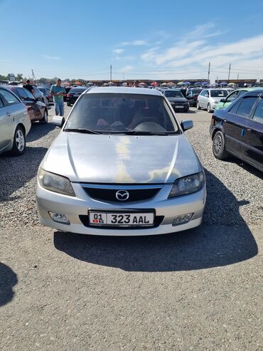 купить запчасти на опель вектра б: Mazda Familia: 2001 г., Хэтчбэк