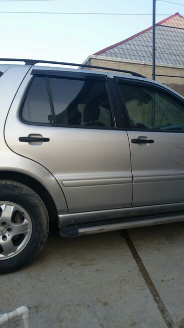 Mercedes-Benz: Mercedes-Benz ML 270: 2.7 l | 2003 il Universal — 12