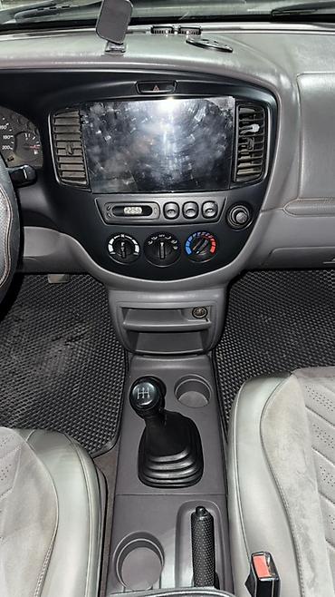 old man: Mazda Tribute: 2003 г., 2 л, Механика, Газ, Кроссовер — 10
