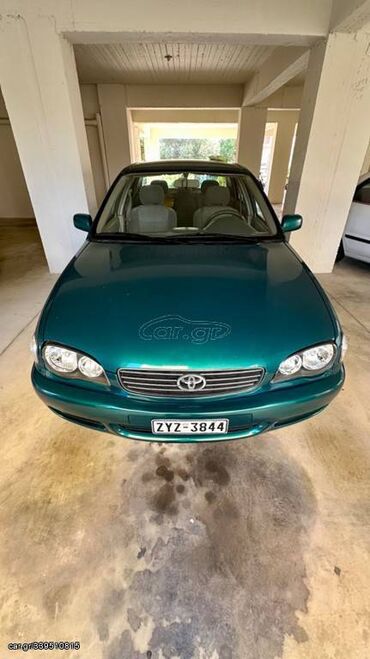 Toyota Corolla: 1.4 l | 2000 year Limousine