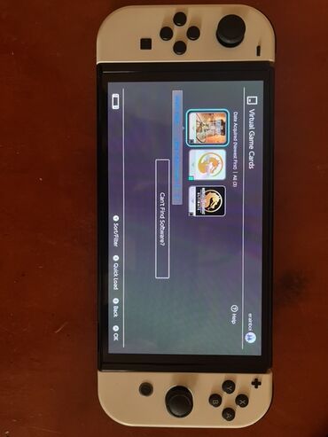 Nintendo Switch: Nintendo Switch OLED (ağ Joy‑Con) oyun konsolu Xüsusiyyətlər: - 7 — 5