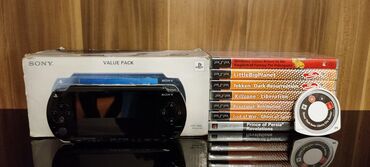 kral games: PSP 1000 K + 8 UMD games + ( 3 yazilmish oyun) Butun kabeller daxildi
