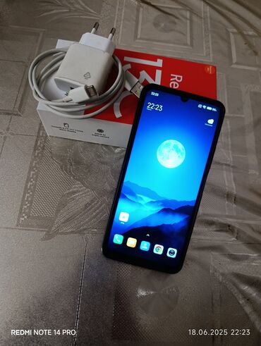 irşad iphone 13 pro max qiymeti: Xiaomi Redmi 13C, 128 GB, rəng - Mavi, 
 Barmaq izi, İki sim kartlı, Face ID