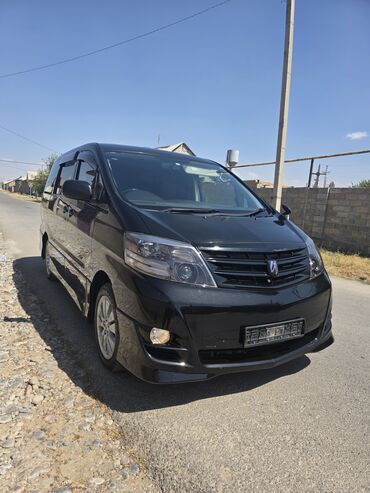 домик на колесо: Черный минивэн Toyota Alphard с тонированными стеклами и