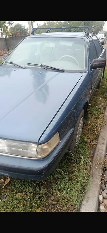 Oldsmobile: Mazda 626: 1988 г., Седан — 4