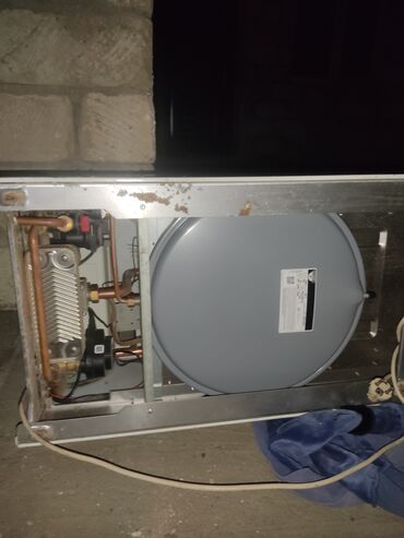 Özü yapışan divar kağızları: Məhsul: Bauger THERM divar tipli qaz kombi (ikinəfəsli – istilik və