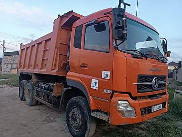 Грузовики: Самосвал Dongfeng, оранжевый, колесная формула 6x4. Стальной кузов с — 2