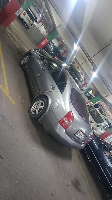 манипулятор токмок: Nissan Primera: 2003 г., 2 л, Автомат, Бензин, Седан — 3
