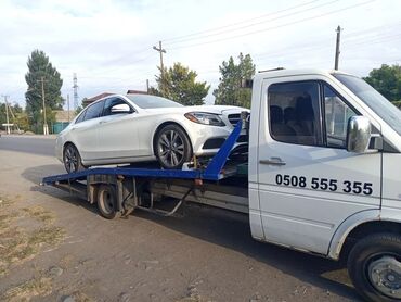 Услуги эвакуатора: С прямой платформой — 12