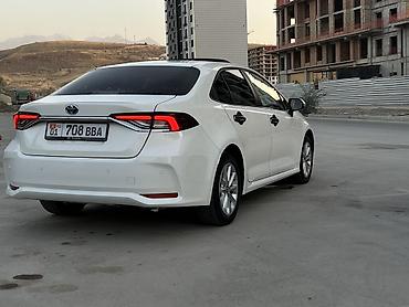 byd e2: Toyota Corolla: 2021 г., 1.8 л, Вариатор, Гибрид, Седан — 5