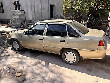 daewoo labo: Daewoo Nexia: 2010 г., Механика, Бензин, Седан — 5