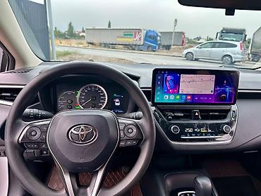bmw ix3: Toyota Corolla: 2022 г., 1.8 л, Автомат, Гибрид, Седан — 5