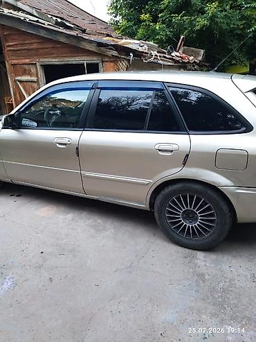 e53 amg: Mazda Familia: 2002 г., 1.6 л, Универсал — 2