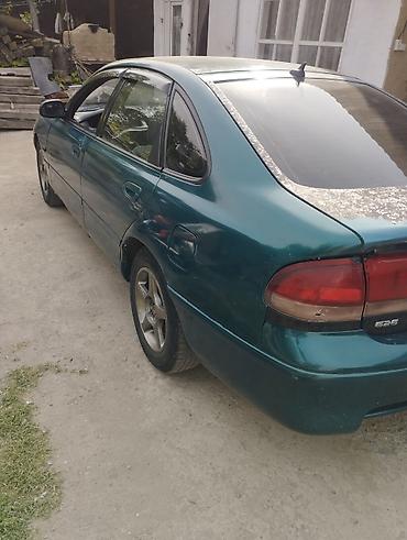 мото номер: Mazda 626: 1991 г., Бензин, Хэтчбэк — 1