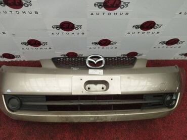 Двери: Передний Бампер Mazda