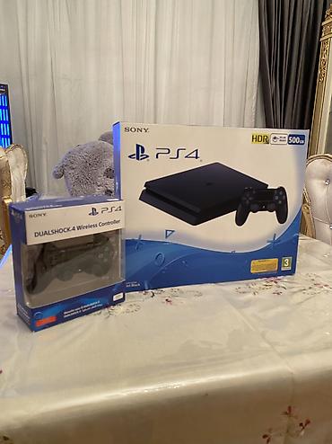 nintendo switch lite 100$: Sony PlayStation 4 (PS4) Slim oyun konsolu - Rəng: Jet Black - — 1