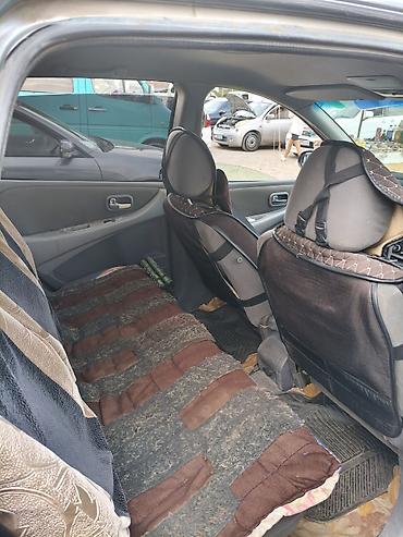 devo tiko: Nissan Almera Tino: 2003 г., Минивэн — 5