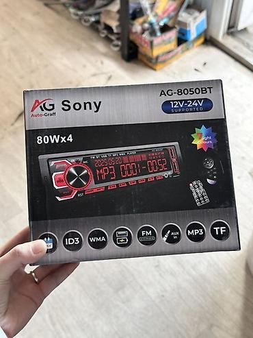 аудй 100: Автомагнитола AG-8050BT с Bluetooth, поддержкой 12V–24V и мощностью — 1