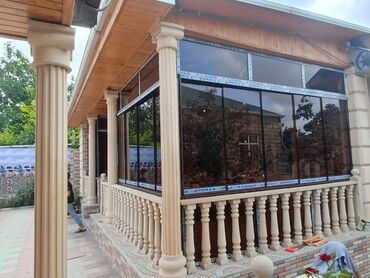 Barmaqlıqlar: Veranda və eyvanların şüşələnməsi – sürgülü sistemlər -
