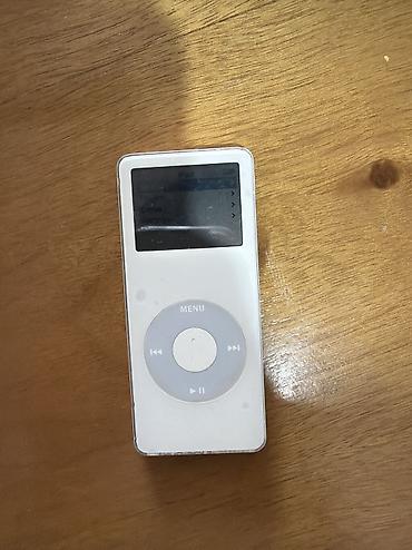 Башка аудиотехника: IPod nano. Все работает, 2гб примерно 300песен можно, аккум держит — 1