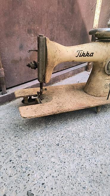 tikis aparati: Məhsul: Tikka tikiş maşınının gövdəsi (mexaniki, vintaj model) — 1