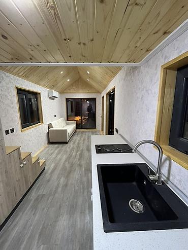 Konteynerlər: Modul tipli mobil ev – “tiny house” Xüsusiyyətlər: - Daşınan — 6