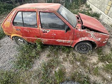 кызыл кия кыз: Nissan Март: 1992 г., Хетчбек — 5