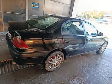 фреон 32: Toyota Avensis: 1998 г., 1.6 л, Седан — 7